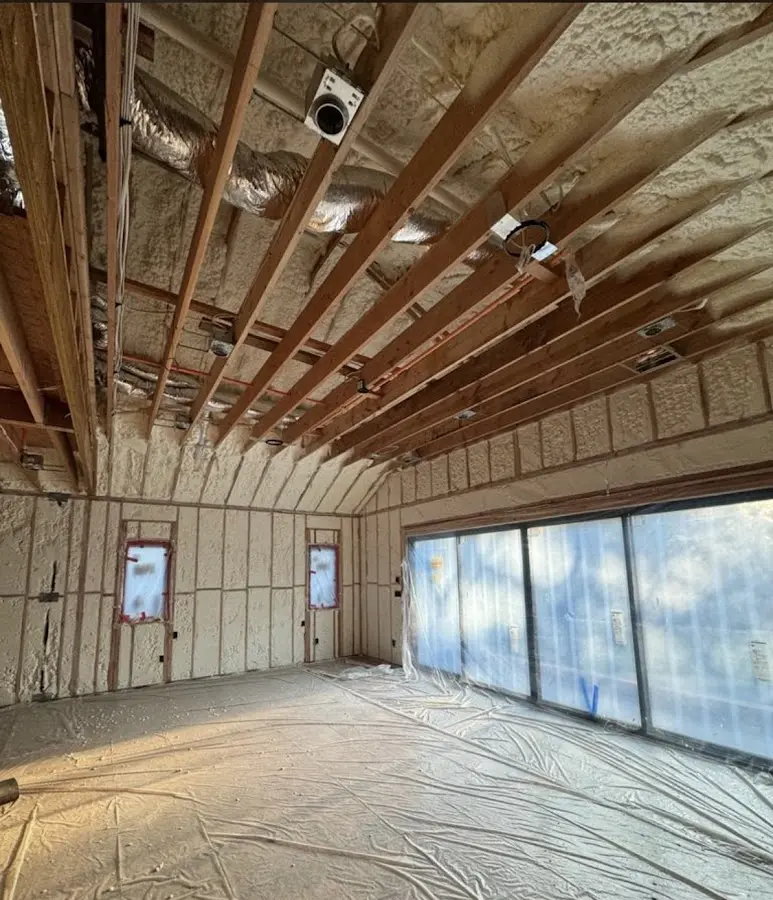 Interior walls and ceiling insulated with spray foam during new construction in Andalusia
